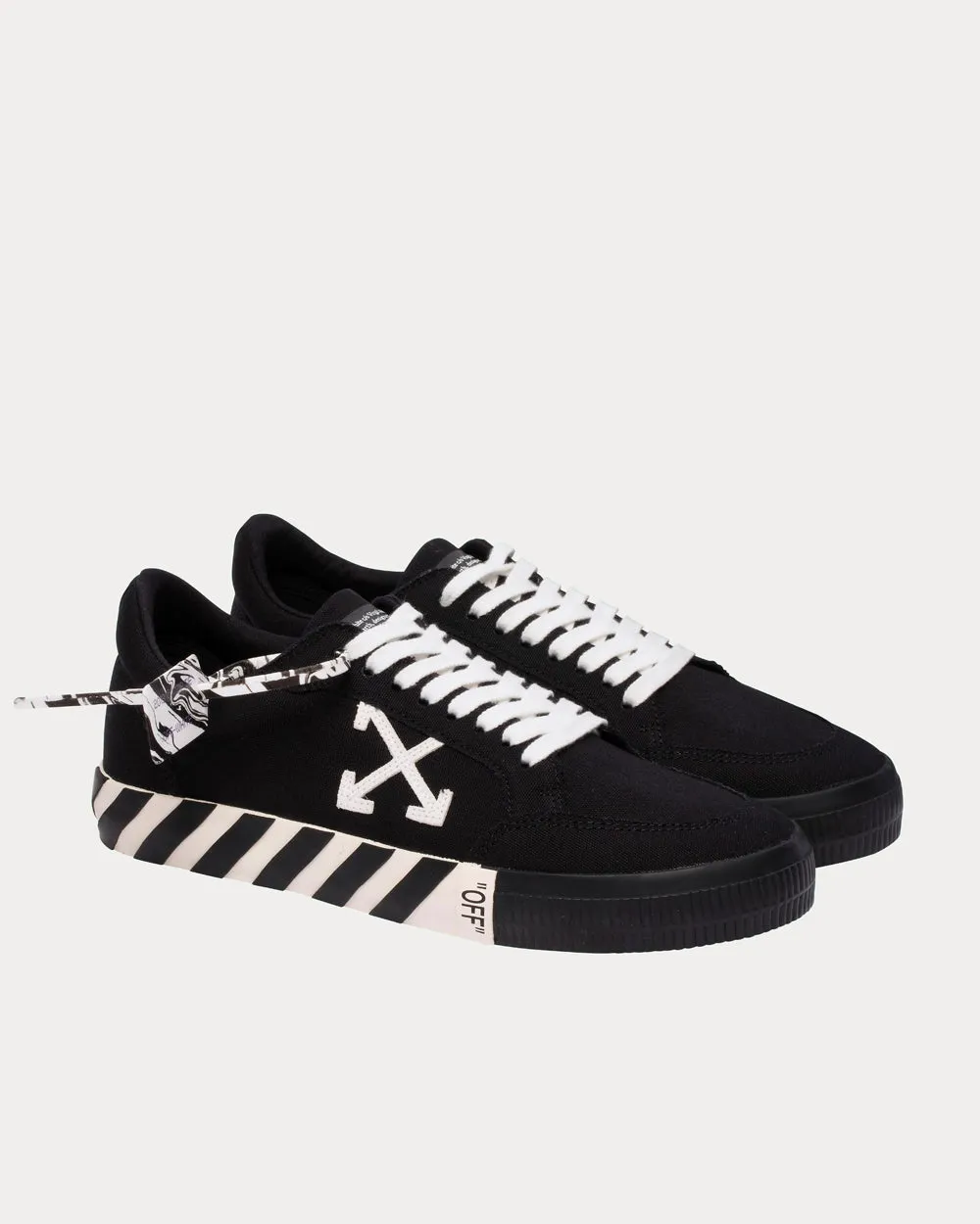 Vulcanized Black Low Top Sneakers